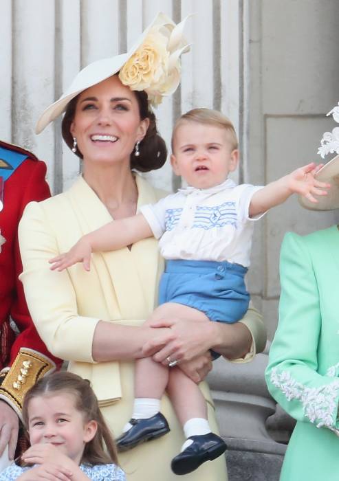 Prince William and Kate Middleton spotted with their children and puppy during family trip out
