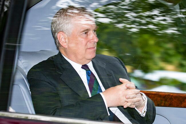 Prince Andrew is all smiles as he drives to meet New Granddaughter