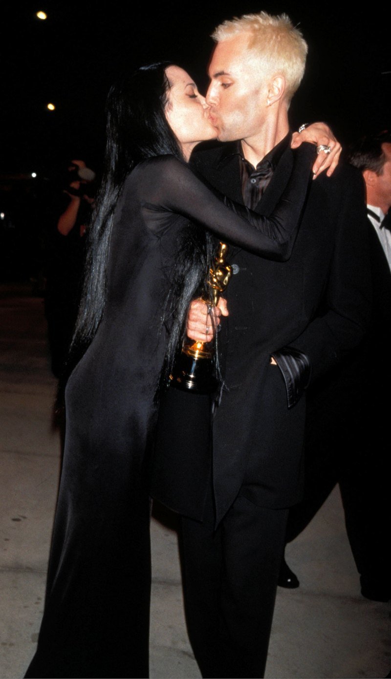 Why did Angelina Jolie make out in public with her brother?