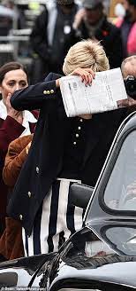 Elizabeth Debicki Sports Princess Diana's Signature Locks As She Pushes Her Way Through The Paparazzi To Talk To A Taxi Driver While Filming New Scenes For Series Five Of The Crown In Croydon