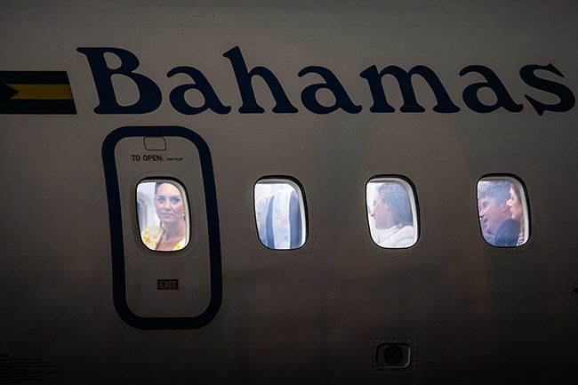 The royals are always seated at the front of the plane followed by their team