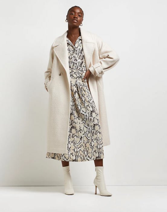 Sophie Wessex Takes New York By Storm In Chic Cream Coat and Heeled Boots