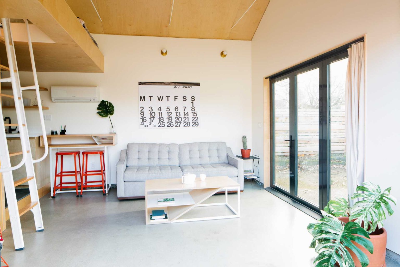 This Garage Was Converted To Include A Loft Bedroom, Kitchen, And Bathroom