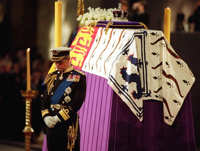 Prince Charles at the Queen Mother's funeral in 2002