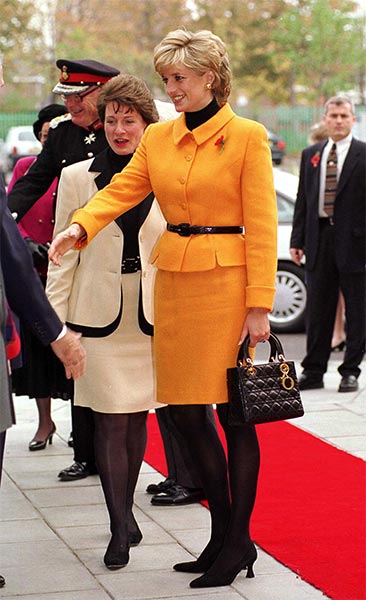 Princess Diana, pictured in 1995, would hold her bag in her left hand