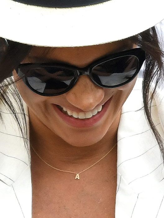 The Duchess wearing an 'A' necklace at Wimbledon in 2019