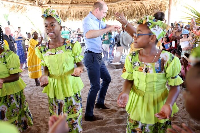 Prince William dances during a traditional Garifuna festival in Belize