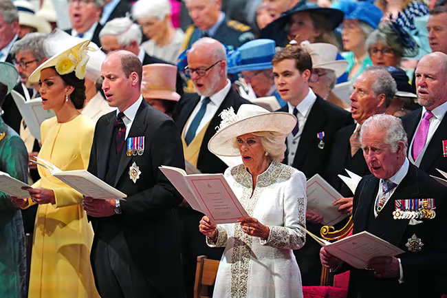 Kate looked radiant singing hymns during the service