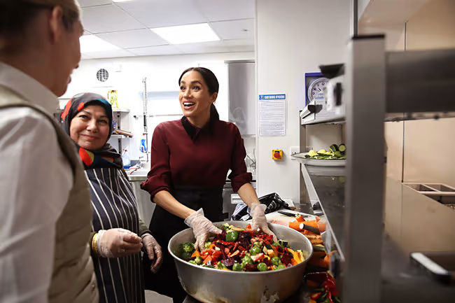 Meghan visiting the Hubb Community Kitchen whilst pregnant with Archie