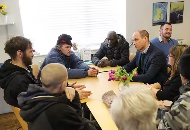 William chats to centre users at The Beacon Project