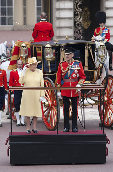 The Queen reviewing the troops with Prince Philip in 2012