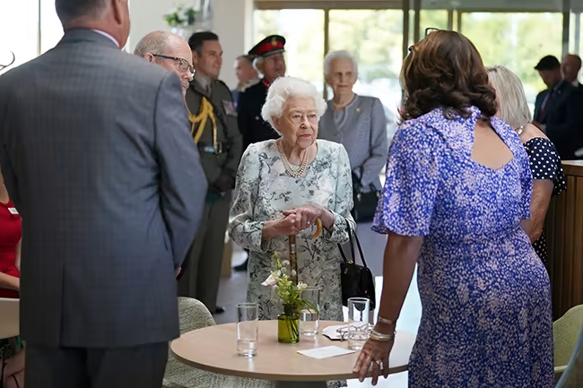 She met with staff and volunteers during the tour