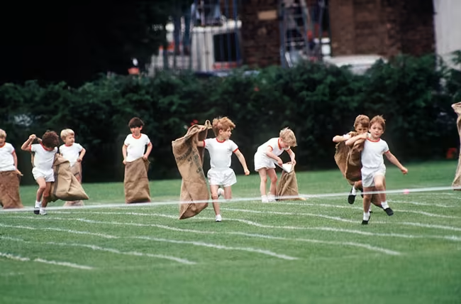 Prince Harry competing in the sack race