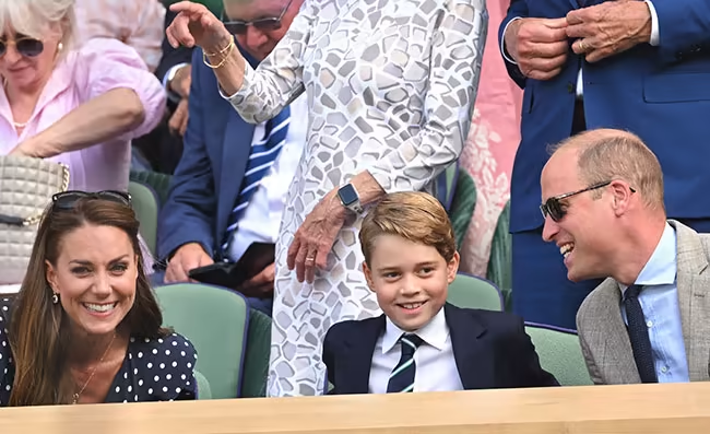 Prince George seen with his parents during Wimbledon