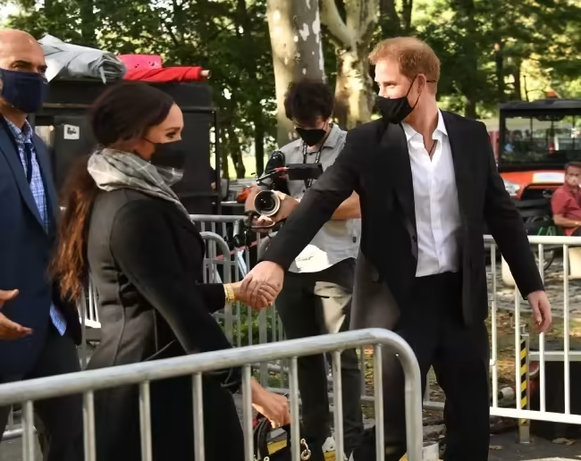 The pair were pictured with film crews in New York City