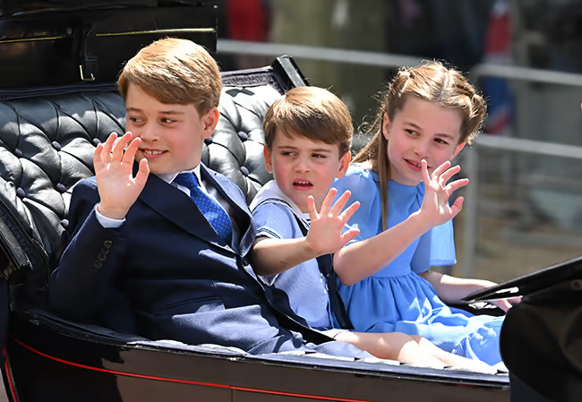 Prince George is having to learn how to do his own tie