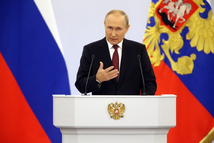 633d7b225cc3b President Vladimir Putin formally signs laws annexing four Ukrainian regions