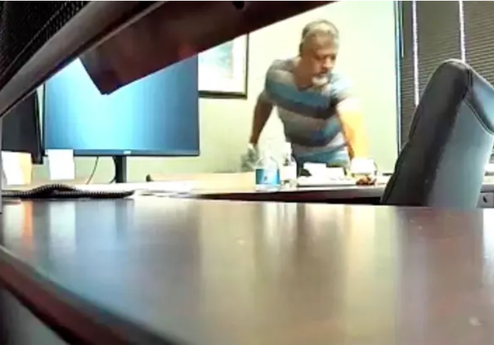 Office custodian accused of putting his penis into woman's water bottle and urinating in it, giving her STD (video)