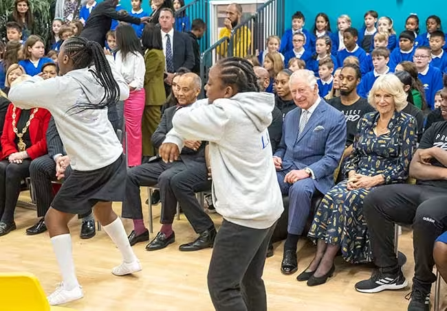 The royal couple watched a lively dance performance
