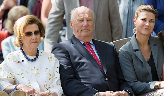 King Harald and Queen Sonja with their only daughter