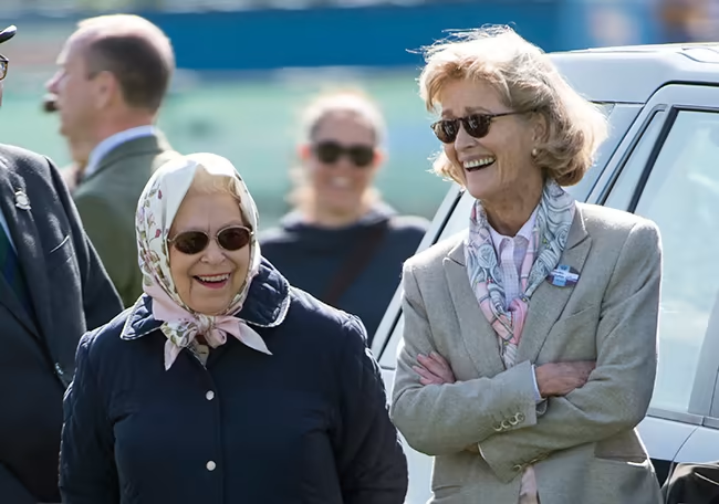 The Queen pictured laughing with Penny