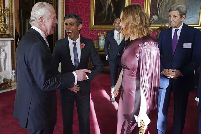 The fashion designer made Charles chuckle