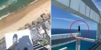 Daredevils take selfies on top of skyscraper without any safety gear after illegally gaining entry to the roof