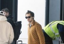 Harry Styles looks weary as he steps out in Gucci tracksuit in LA after returning from tour