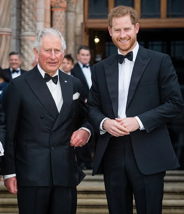 Charles pictured with Prince Harry in happier times