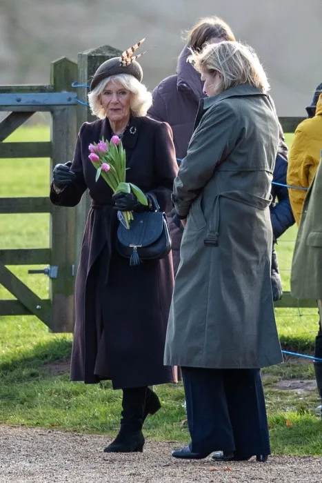 Camilla was given flowers by a member of the public