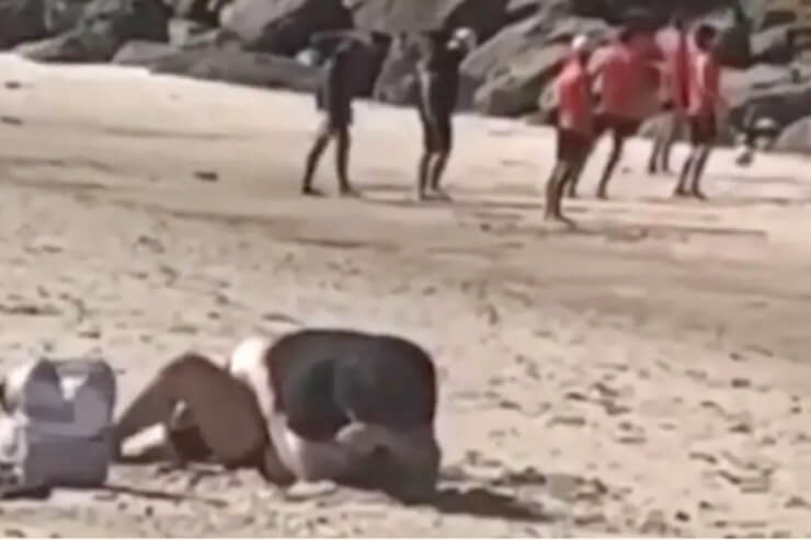 Couple confronted while having hot bed activities on packed public beach