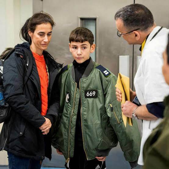 Hamas-FORCED-12-year-old-boy-hostage-to-watch-footage-of-October-7-attack-and-threatened-children-with-rifles-if-they-cried-0484-1