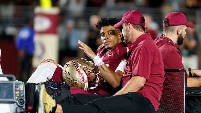 jordan travis taken out on a stretcher 