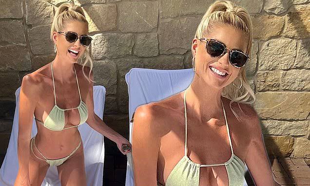 Emma Hernan shows off HER toned figure in a skimpy bikini by the pool 737373