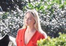 Margot Robbie shows off her toned leg as she films commercial in Malibu WITH Jacob Elordi