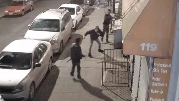 Man-SLASHES-brute-with-a-huge-katana-sword-after-gang-urinated-on-his-New-York-apartment-1