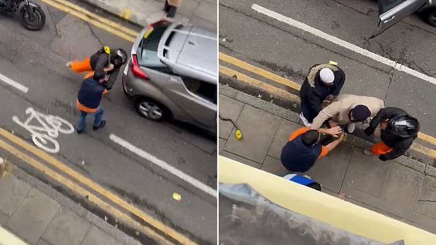 Driver HITS motorcyclist in road rage row - only to be hit by a right hook in return