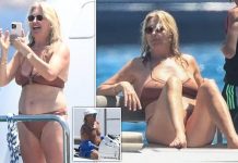 Penny Lancaster, 53, looks HOT in tiny red bikini as she enjoys trip on yacht with her husband Rod, 79