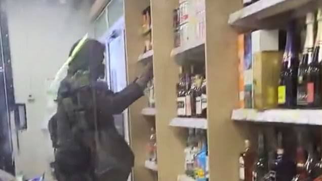 Thieves ransacking store were caught OUT - before one escapes and is hit by car_ video 726226