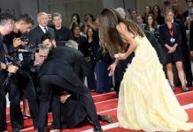 George Clooney ‘tears’ himself AWAY from wife to help photographer who took a tumble