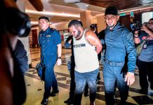 Wahalur!!! Nigerian Man Charged With Biting Off Police Officer’s Ear In Malaysia