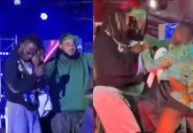 Was It Staged? Man Storms Stage To Attack Naira Marley During Lagos Performance