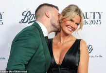 Kerry Katona flaunts the results of her latest breast surgery as she cosies up to toyboy boyfriend