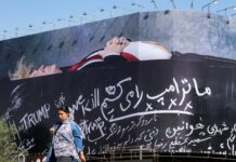Iran UNVEILS huge billboard of Donald Trump in a coffin saying ‘we will kill’ him