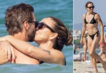Mel C and new husband Chris Dingwall passionately kiss one another during honeymoon in IbizaÂ