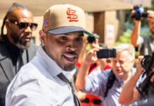 Singer Chris Brown pleads guilty to attacking music producer with a BOTTLE in nightclub
