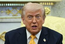 Trump makes light of Iran conflict and says ‘It’s not a war’ even as FOUR times as 767 troops lie wounded